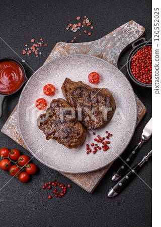 Juicy beef steak grilled with salt, spices and herbs Juicy beef steak grilled with salt, spices and herbs 120552025