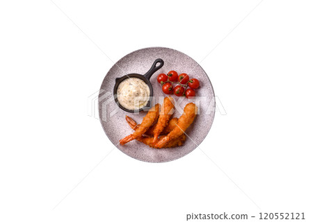 Hot crispy shrimp breaded with salt and spices with white sauce 120552121