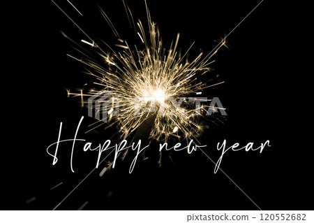 Happy new year yellow sparkler new years eve countdown. Luxury entertainment celebration turn of the year party time. Premium nightlife visual with glowing light sparks on dark background. Happy new year yellow sparkler new years eve countdown. Luxury entertainment celebration turn of the year party time. Premium nightlife visual with glowing light sparks on dark background. 120552682