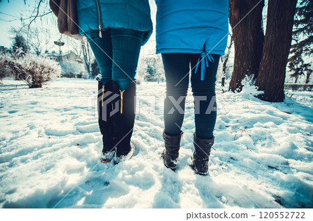 Hands of young people in the winter.Little Children Enjoying Snowfall and Playing in the Snow 120552722