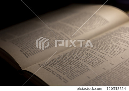 macro photography of a book page with text in Latin font macro photography of a book page with text in Latin font 120552834