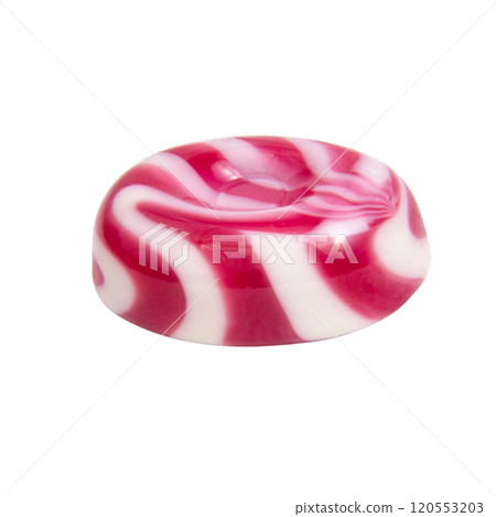 Striped milky caramel candy isolated on the white background Striped milky caramel candy isolated on the white background 120553203