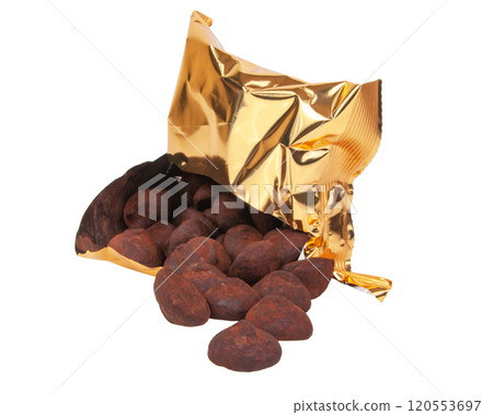 Dark chocolate truffle sweets in package isolated on the white background Dark chocolate truffle sweets in package isolated on the white background 120553697