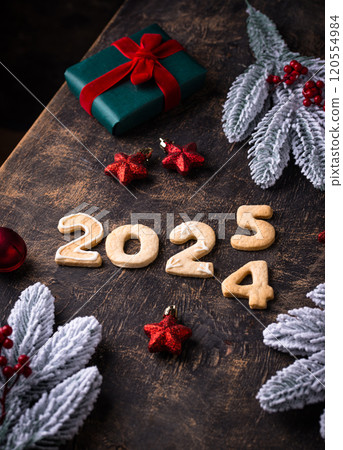Festive New Year cookies in shape of 2025 120554984