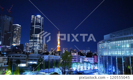 Tokyo Tower stands out among the illuminated skyscrapers at night Tokyo Tower stands out among the illuminated skyscrapers at night 120555045