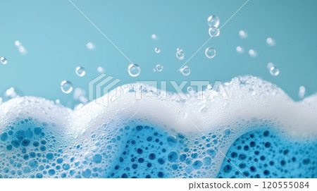 Isolated soap foam, bubbles, and blue sponge Isolated soap foam, bubbles, and blue sponge 120555084