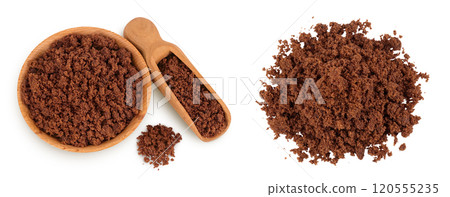 Dark muscovado sugar or Barbados sugar in wooden bowl isolated on white background. Top view. Flat lay 120555235