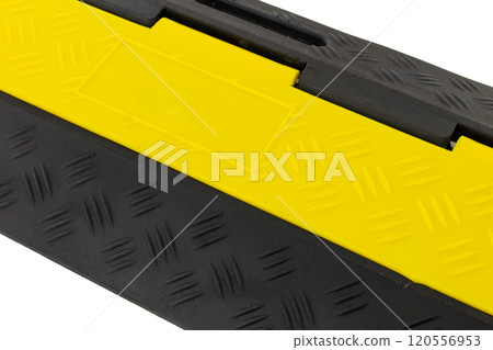 Close Up of Black and Yellow Cable Ramp Close Up of Black and Yellow Cable Ramp 120556953