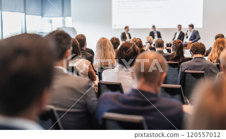 Interview and round table discussion at business convention and presentation. Audience at the conference hall. Business and entrepreneurship symposium. 120557012