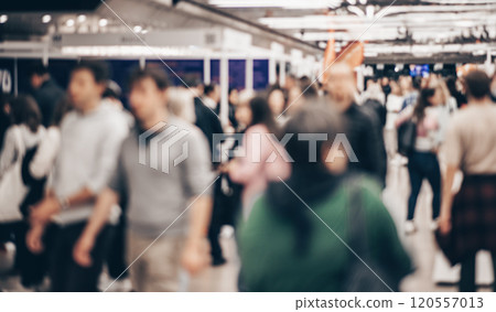 Abstract blurred people at exhibition hall of expo event trade show. Business convention show or job fair. Business concept background Abstract blurred people at exhibition hall of expo event trade show. Business convention show or job fair. Business concept background 120557013