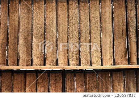 Old thick books in a library 120557835
