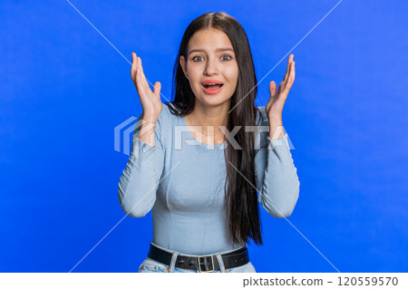 Excited amazed woman surprise looking at camera with big eyes, shocked by sudden victory wow emotion 120559570