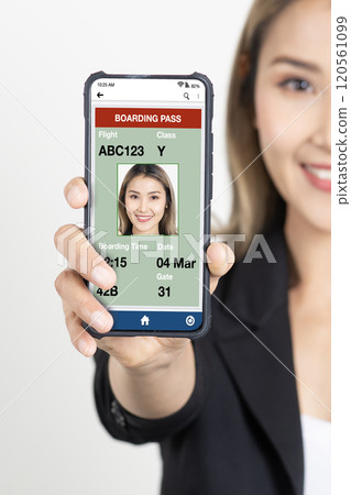 Businesswoman showing electronic boarding pass on smartphone screen. Businesswoman showing electronic boarding pass on smartphone screen. 120561099