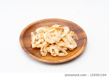 Smoked squid slices on a wooden plate (ikakun) Smoked squid slices on a wooden plate (ikakun) 120561184