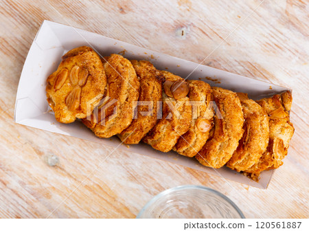 Crispy almond cookies served for dessert Crispy almond cookies served for dessert 120561887