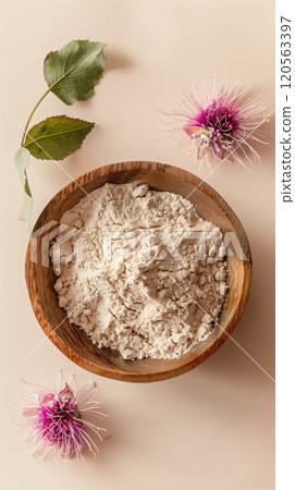 Burdock extract flour flower organic natural ingredient on wooden bowl story background 120563397