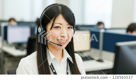 Female operator working at a corporate call center 120563537