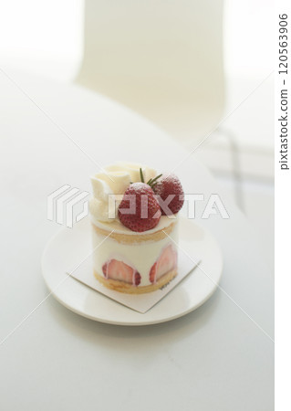 A delectable strawberry shortcake topped with fresh strawberries and cream. A delectable strawberry shortcake topped with fresh strawberries and cream. 120563906