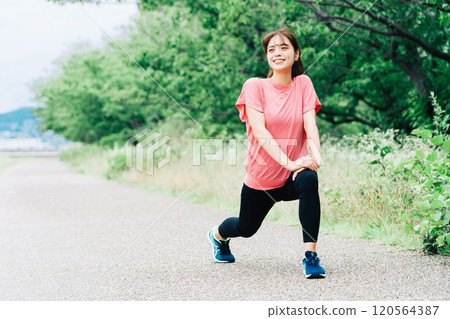 Women stretching 120564387
