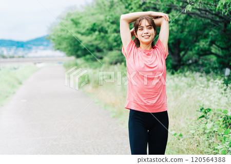 Women stretching 120564388