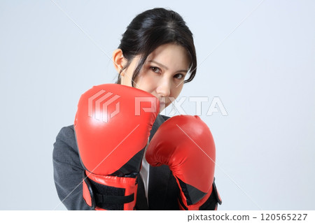 Businesswoman boxing image 120565227