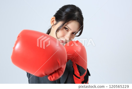 Businesswoman boxing image Businesswoman boxing image 120565229