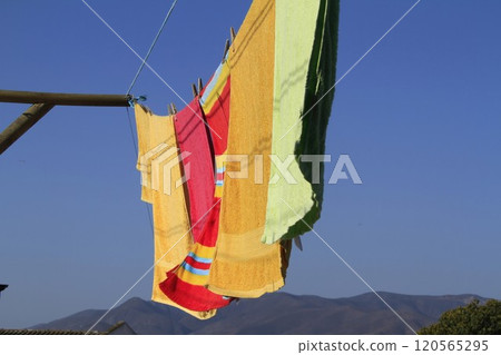Towels fluttering in wind at La Serena Chile Towels fluttering in wind at La Serena Chile 120565295