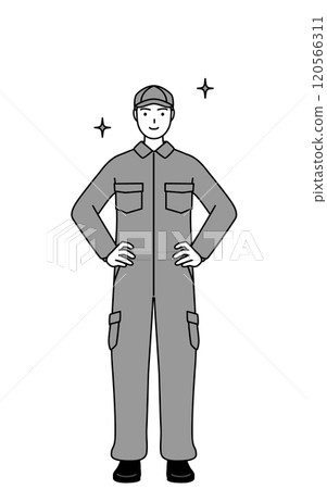 A mechanic in overalls with his hands on his hips 120566311