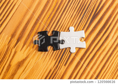 A black and white puzzle piece fit for a concept of yin yang or opposites 120566616