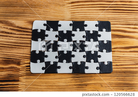 Black and white puzzle, teamwork challenge concept Black and white puzzle, teamwork challenge concept 120566628