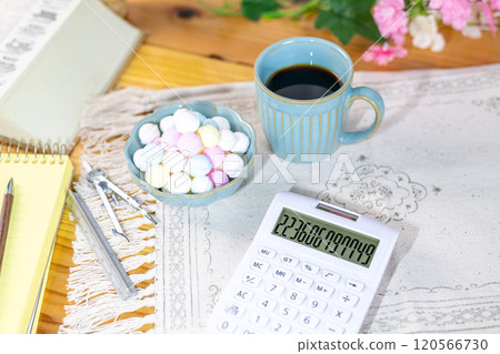 Colorful Ramune and coffee prepared on a table with study materials 120566730