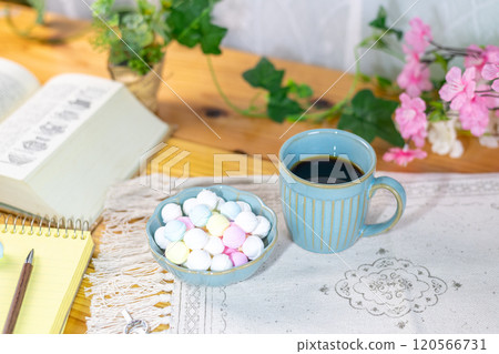 Colorful Ramune and coffee prepared on a table with study materials Colorful Ramune and coffee prepared on a table with study materials 120566731