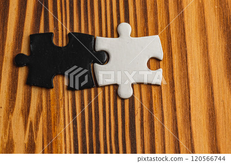 A black and white puzzle piece fit for a concept of yin yang or opposites A black and white puzzle piece fit for a concept of yin yang or opposites 120566744