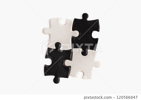 A puzzle piece with and black, sense of incompleteness and mystery A puzzle piece with and black, sense of incompleteness and mystery 120566847