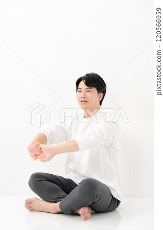 A man stretching 120566959