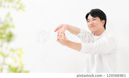 A man stretching 120566961