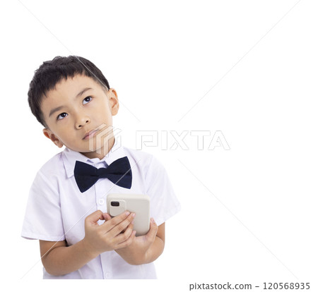 Thinking dreaming and confuse kid using mobile phone Thinking dreaming and confuse kid using mobile phone 120568935