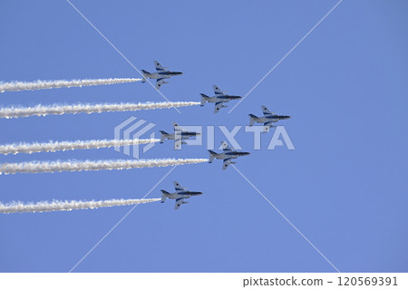 Blue Impulse flying in the blue sky Blue Impulse flying in the blue sky 120569391