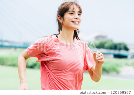 A woman who jogs A woman who jogs 120569597