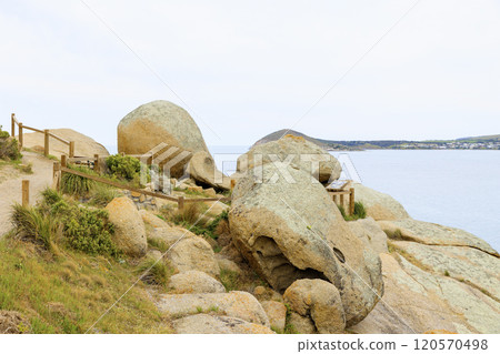 Large rock formations and the ocean at Granite Island Recreation Park Large rock formations and the ocean at Granite Island Recreation Park 120570498