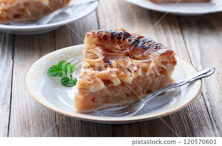 Apple pie (cut image) on old wooden background Apple pie (cut image) on old wooden background 120570601