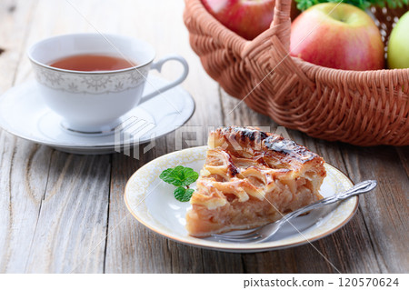 Apple pie (cut image) on old wooden background Apple pie (cut image) on old wooden background 120570624