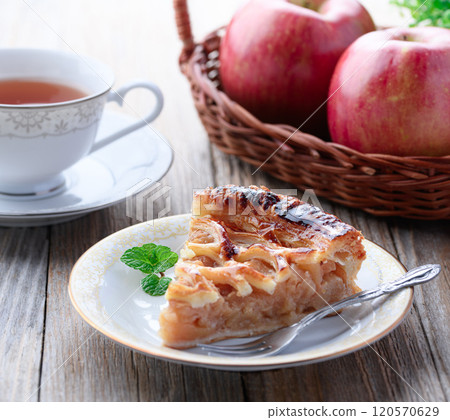 Apple pie (cut image) on old wooden background Apple pie (cut image) on old wooden background 120570629