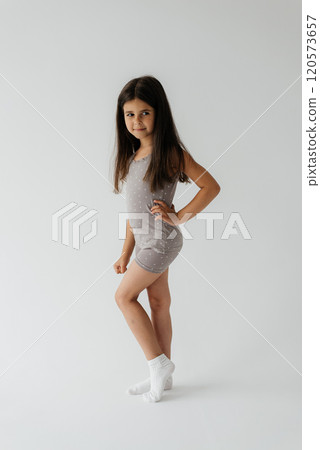 Cute girl 4-5 year old posing in studio Cute girl 4-5 year old posing in studio 120573657