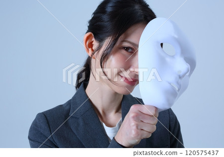 Image of a female office worker wearing a mask Image of a female office worker wearing a mask 120575437