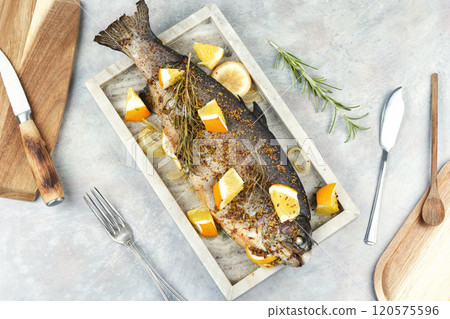 Baked or roasted trout fish. 120575596