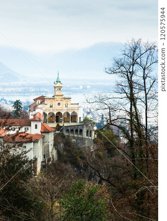 Madonna del Sasso in Orselina above city Locarno at lake Maggiore. Switzerland. Madonna del Sasso in Orselina above city Locarno at lake Maggiore. Switzerland. 120575944