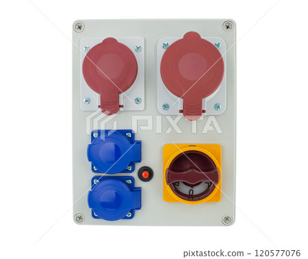 High quality close up of an electrical power distribution box featuring safety switches and colored sockets High quality close up of an electrical power distribution box featuring safety switches and colored sockets 120577076