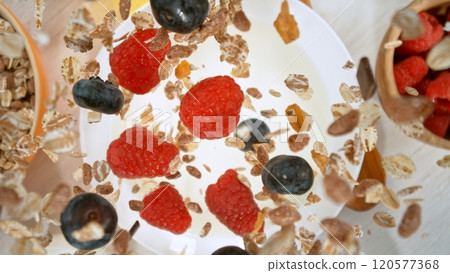 Freeze motion of flying group of cereal breakfast mix. Healthy eating and diet concept. Freeze motion of flying group of cereal breakfast mix. Healthy eating and diet concept. 120577368