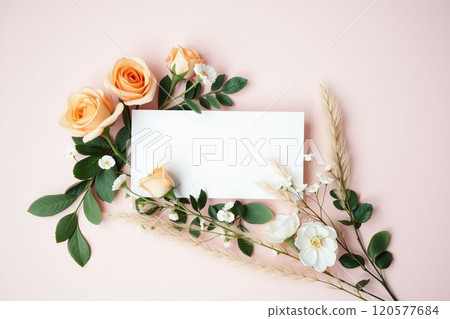 White card surrounded by pink roses and floral ornaments White card surrounded by pink roses and floral ornaments 120577684